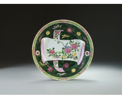 A Chinese famille rose plate, Qianlong, of plain circular shape and painted in colours with peonies on scroll panels against 