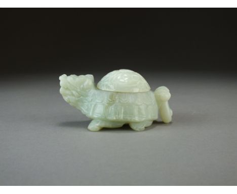 A Chinese pale green Jade figure of a mythical turtle, late Qing Dynasty, 10.5cm long.