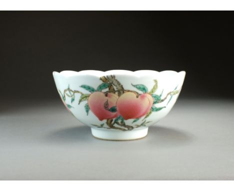 A Chinese famille rose porcelain peach bowl, Qianlong seal mark but later, of rounded form with lobed rim, painted in colours