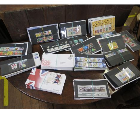 Four albums of First Day Covers, 2000 - 2010, another of Olympic Gold medal winners 2012, and a large quantity of loose sets 