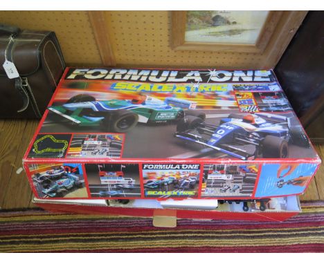 A Scalextric C.818 Formula One set with Ford Benetton and Williams Renault 