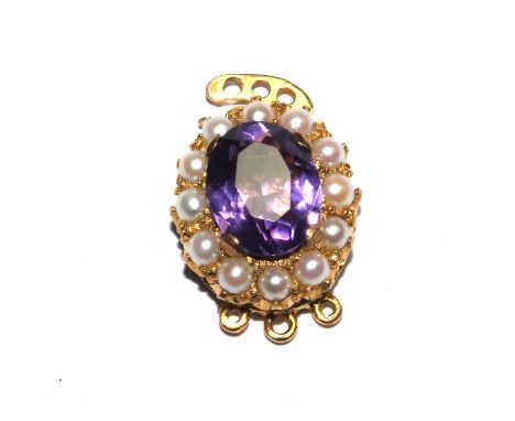 An amethyst and seed pearl clasp 