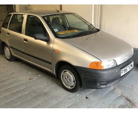 A 1997 Fiat Punto 55 SX, registration number  P967 EWL, mileage 38,500,  5 door hatchback, grey, 1108 cc, first registered 28