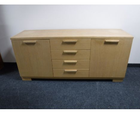 A light oak sideboard 