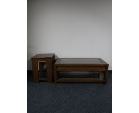 A contemporary oak coffee table with matching lamp table 