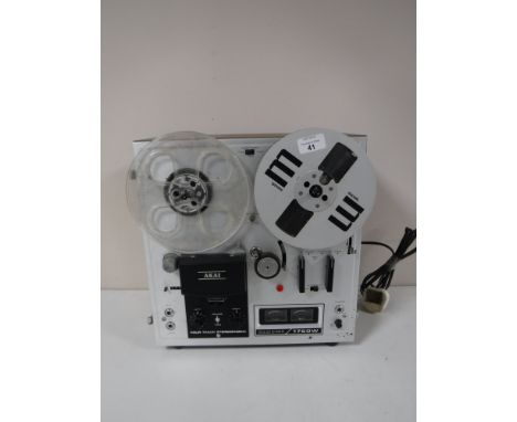 An Akai 1720W Four Track Stereophonic Reel-to-Reel tape recorder. 
