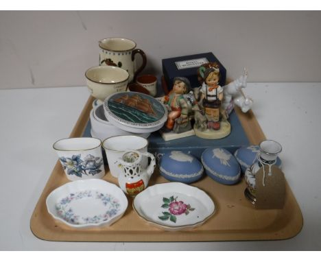 A tray of Wedgwood trinket dishes, two Hummel figures, Torquay ware pottery, Wedgwood plaque, etc  