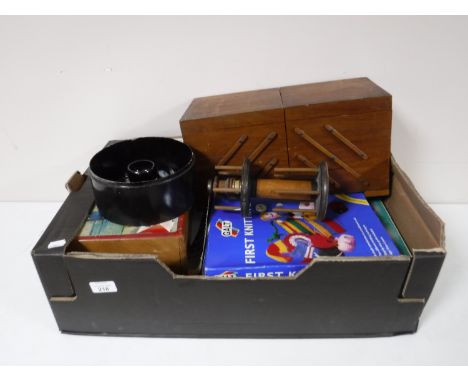 A box containing vintage sewing accessories, concertina sewing box, thread stand, antique tin, etc 