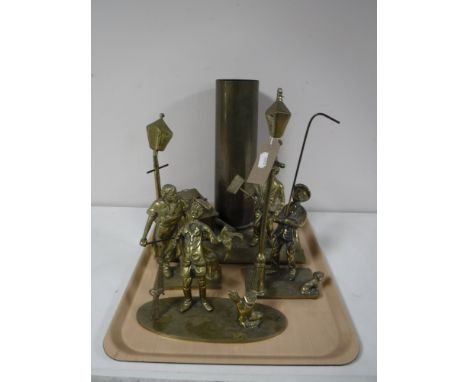 A tray of brass ornaments, lamp lighters, shell 