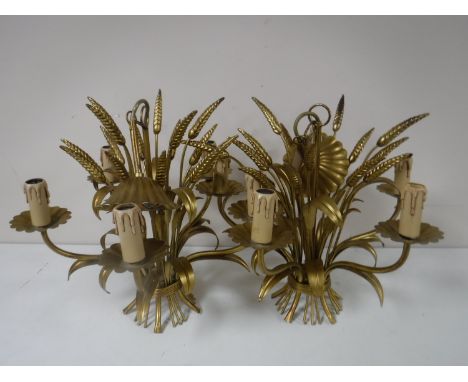 A set of three gilt metal light fittings. (3)