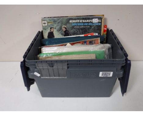 A box containing LP's, vintage songbook, vintage music 
