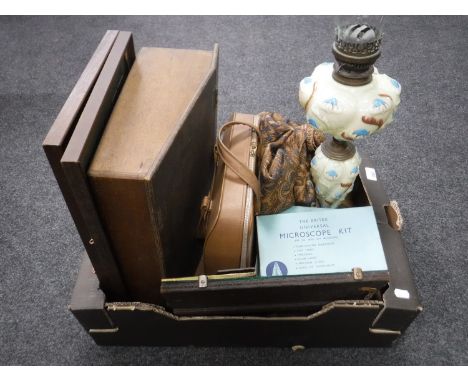 A box of antique wooden writing slope, Victorian glass oil lamp, microscope kit etc  CONDITION REPORT: Lamp with surface wear