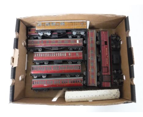 A box containing Hornby Dublo tin plate carriages