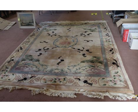 A large cream Chinese wool carpet, 315cm x 245cm