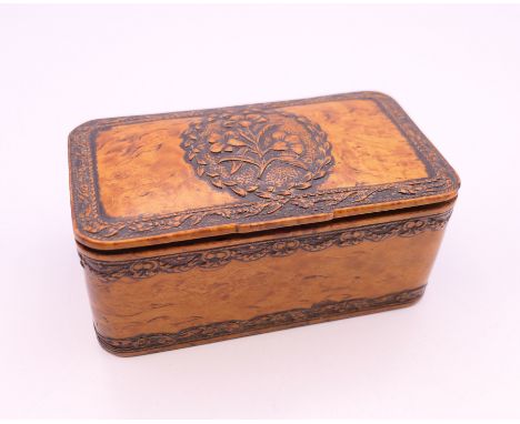 A finely carved early 19th century burr wood table snuff box, fine decoration of flowers and swag border, impressed under lid