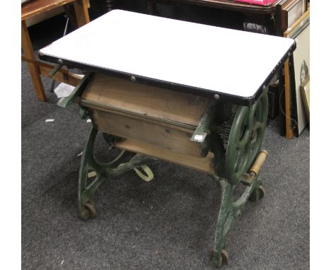 A vintage folding mangle with enamel top. 76.5 cm wide.