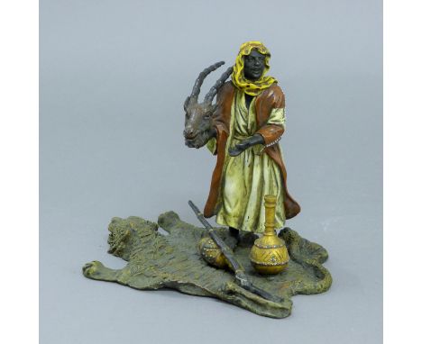 A cold painted bronze model of an Arab huntsman. 14.5 cm high.