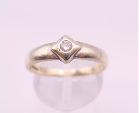 A 9 ct white gold diamond ring. Ring size Q/R. 2.7 grammes total weight.