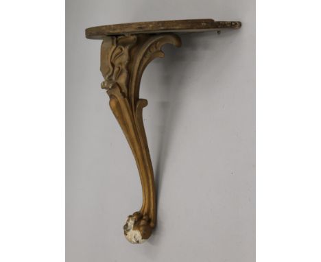 A marble topped gilt console table. 65 cm wide.