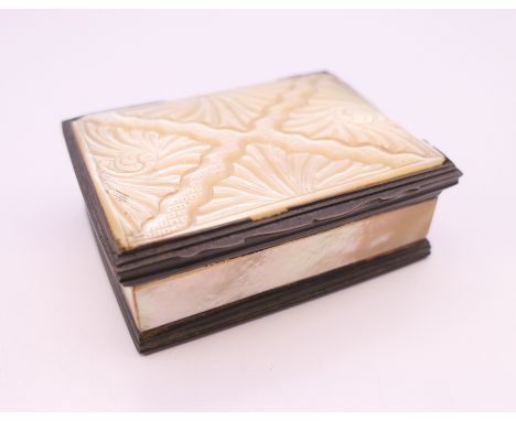 A 19th century mother-of-pearl set snuff box. 6.5 cm wide.