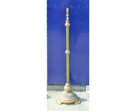 An antique brass standard lamp. 