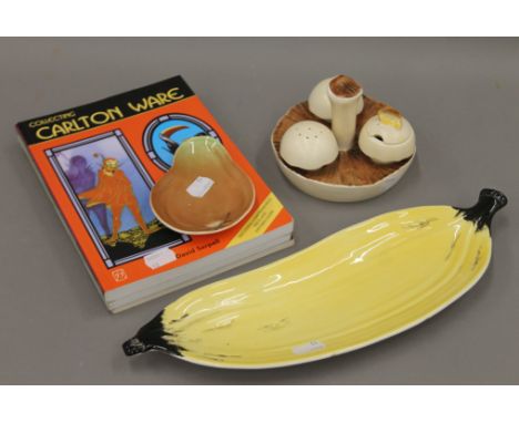 A Carltonware toad stool form cruet, a banana dish, a pear dish and three books. The former 9 cm high.