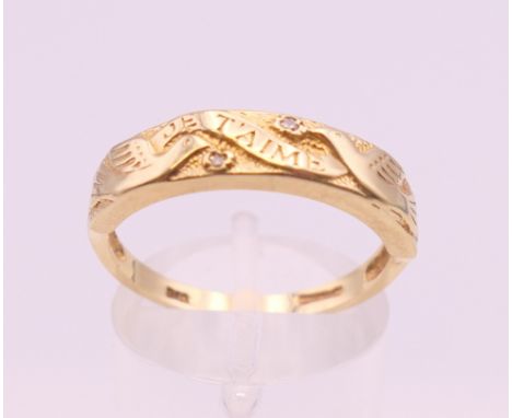 A 9 ct gold ring. Ring size Q/R. 3.8 grammes total weight.