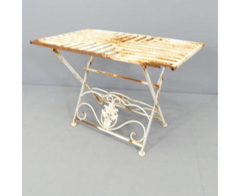 A vintage painted metal folding garden table. 71x50x43cm.