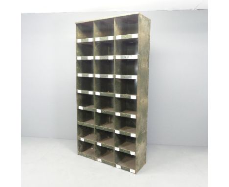 A large vintage industrial green painted storage unit with twenty-four pigeon hole compartments. 92x183x34cm. Good used condi