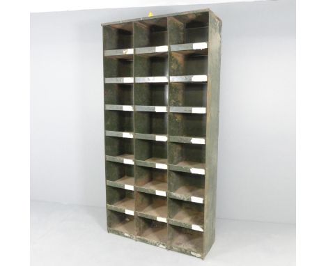 A large vintage industrial green painted storage unit with twenty-four open pigeon hole compartments. 92X183X34cm. Good used 