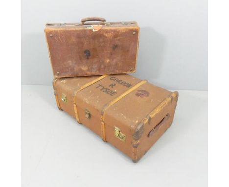 A vintage trunk with label for Burne, named to Gordon R Tysoe, 84x32x53cm, and a leather suitcase. (2).