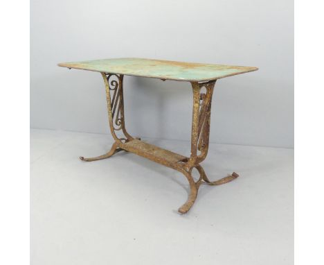 A vintage French painted metal bistro table. 110x70x70cm.