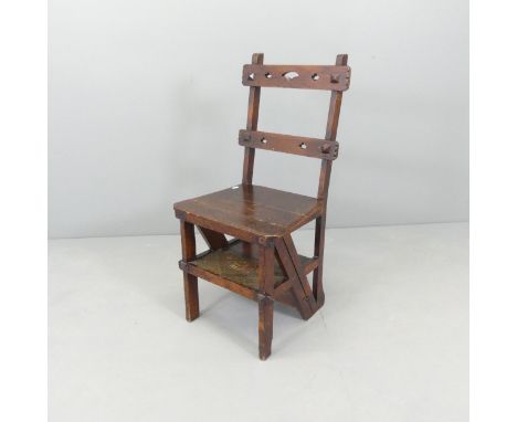 A Victorian Arts &amp; Crafts metamorphic library step chair. Good condition. Hinges have possibly been replaced, various mar