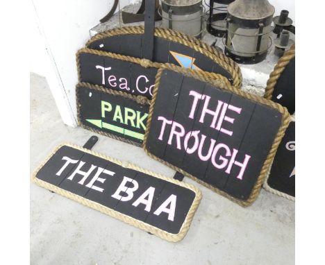 Six various modern painted wooden signs with rope surrounds. Largest 85x55cm. 1x"The Baa", 1x"The Trough", 1x"parking", 1x"Te