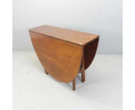 A mid-century teak Danish style drop leaf dining table with label for Nathan Furniture, 98x75x33cm (extending to 169cm), and 