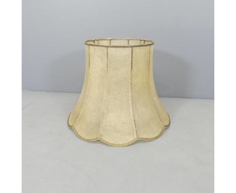 A vintage hide lampshade. 60x44cm (top diameter 36cm).