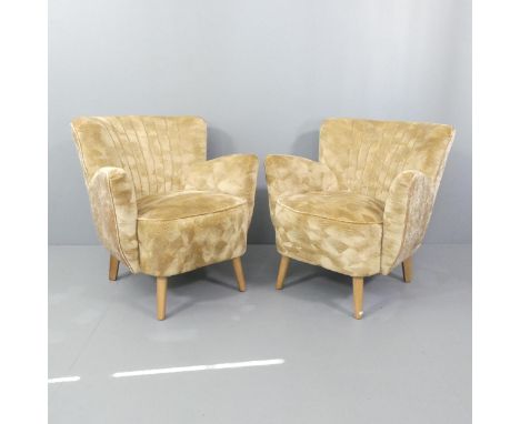 A pair of Art Deco shell back cocktail armchairs. 