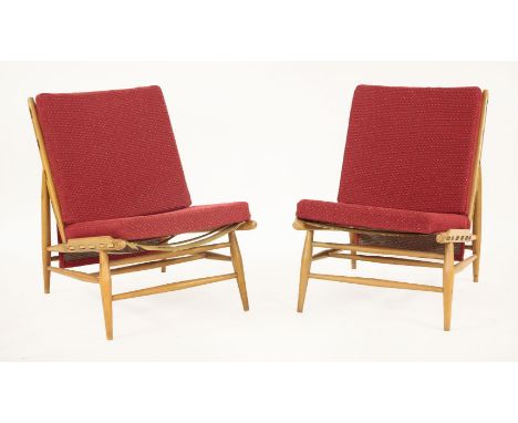 A pair of Ercol 'No. 427' lounge chairs,designed by Lucian Ercolani (1888-1976), both with blue labels and original upholster