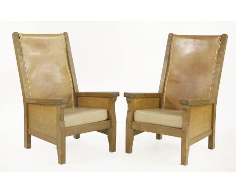 A pair of Robert 'Mouseman' Thompson oak smokers' chairs,with tan leather backs and beige cushions, each left upright carved 