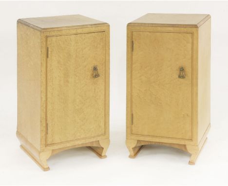 A pair of bird's-eye maple and walnut pot cupboards,opening to reveal an internal shelf,36.5cm wide37cm deep69cm high (2)