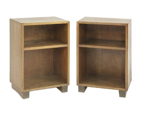 A pair of Arts and Crafts open bedside tables,with a single shelf, raised on block rails, each numbered '32' or '45',45cm wid