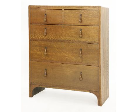 An oak chest,with two short and three long drawers, with turned finial handles,92cm wide45cm deep114.5cm high