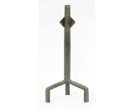 A wrought iron candlestick,after an original by Alberto Giacometti, inscribed 'Diego',38.5cm high