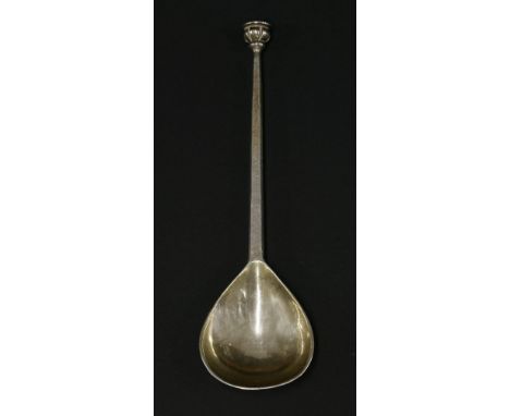 A Guild of Handicrafts hammered silver seal topped spoon,with cast seal faceted stem and pear shaped bowl,together with a sma