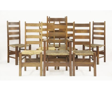 A set of eight Heal's oak Letchworth dining chairs,each with a ladder back and rush seat (6+2)