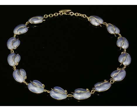 A Danish sterling silver and guilloché enamel leaf necklace, c.1950,by Volmer Bahner & Co., with a series of lily pad leaves 