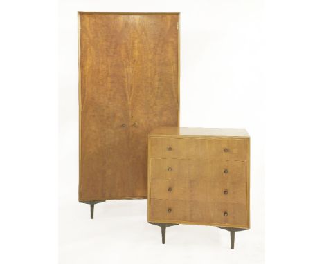 A teak chest by Heal's,with four drawers with ivorine button, turned acorn handles and on a stained stand,76cm wide48cm deep8