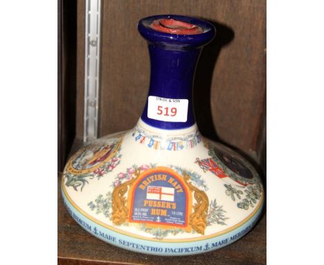 A 1 litre Wade decanter of British Navy Pusser's Rum, 54.5% abv.