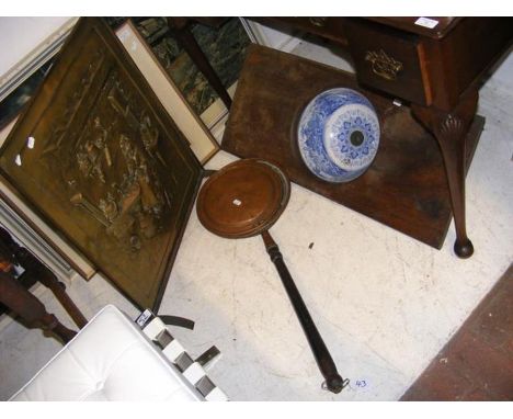 An antique blue and white wash basin together with a fire screen and a bed warming pan