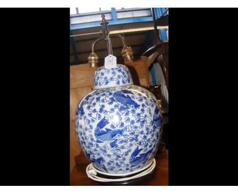 A table lamp in style of a blue and white Oriental ginger jar